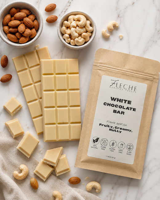 Fleche White chocolate bars with a package on a marble surface with nuts.